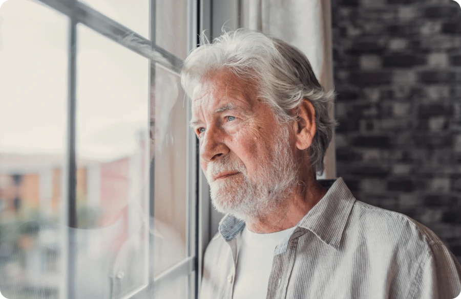 Man at window Website Image beside text 2000 x 1300 px
