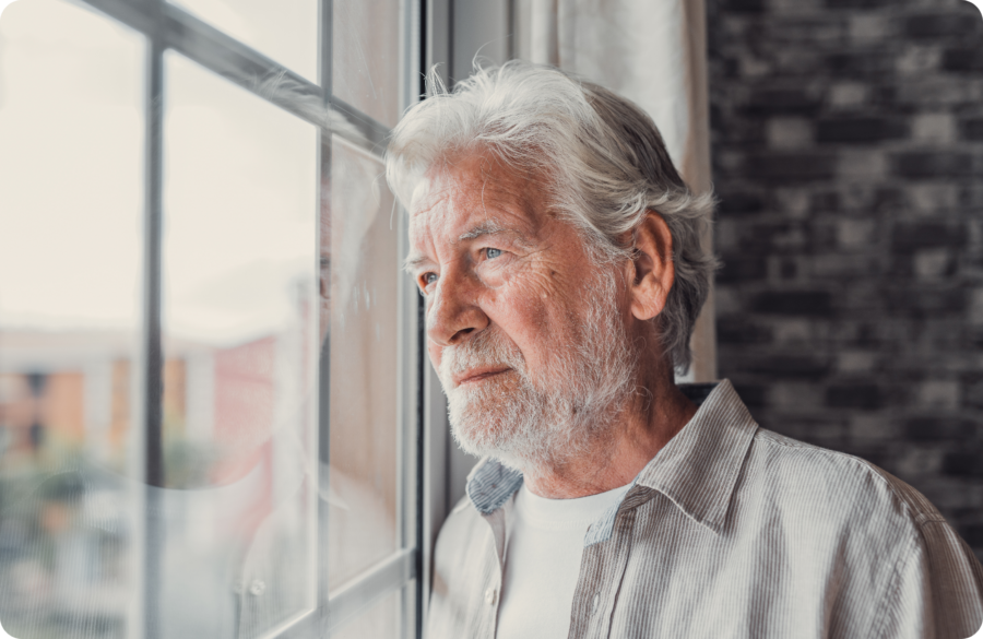 Man at window Website Image beside text 2000 x 1300 px