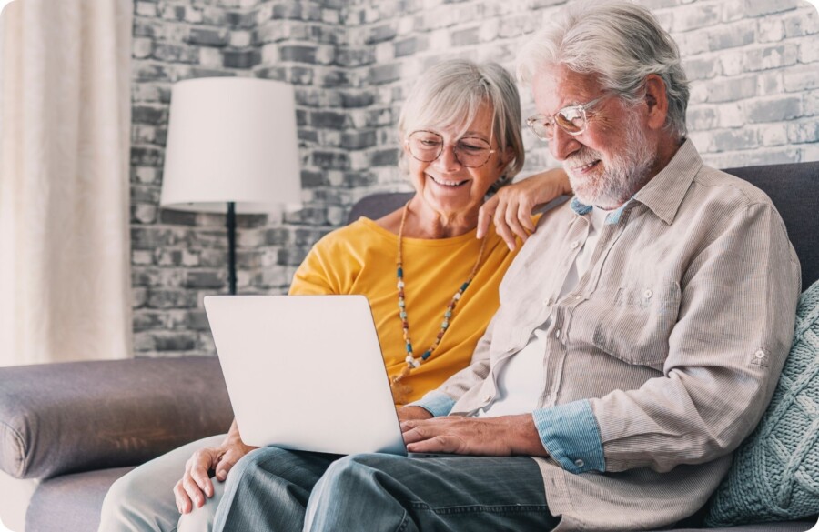 Mature couple with laptop Website Image beside text 2000 x 1300 px