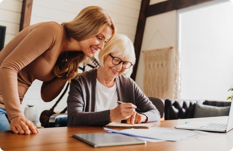 Mother and daughter at desk Website Image beside text 2000 x 1300 px