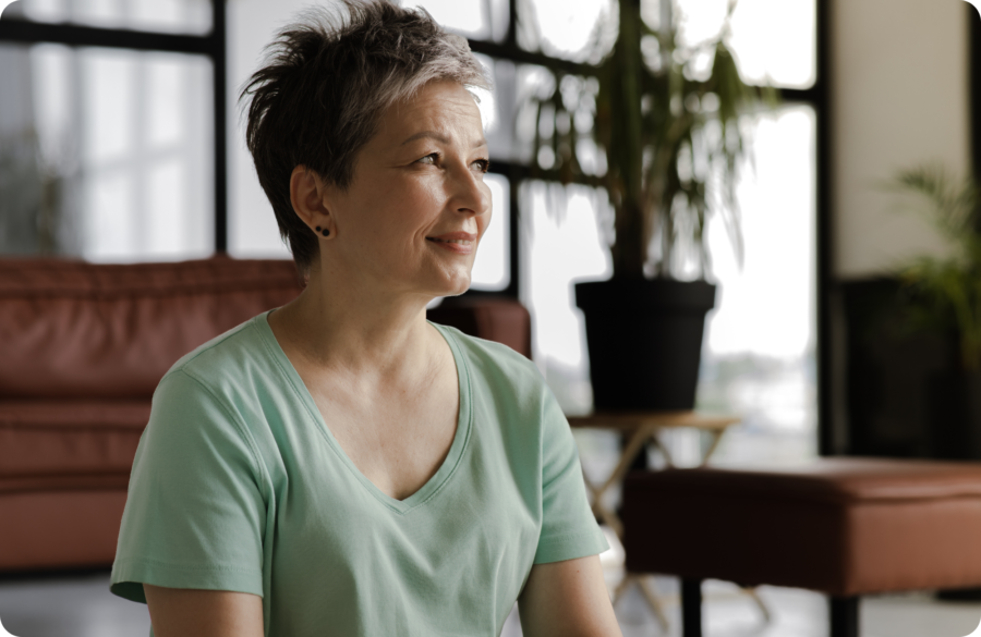 Woman in green shirt Website Image beside text 2000 x 1300 px