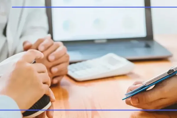 Young couple and estate administrator Advising about settlement