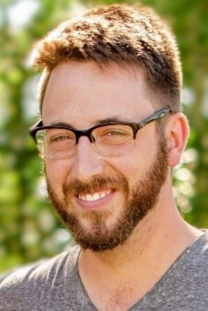 A headshot of Brett Surbey